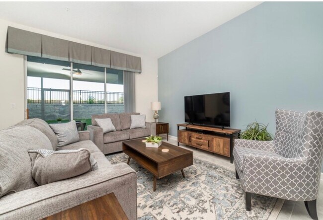 Building Photo - BEAUTIFUL CHAMPIONS GATE 2 BED 2 BATH COND0  w/GARAGE - FULLY FURNISHED - 12 MONTH RENTAL