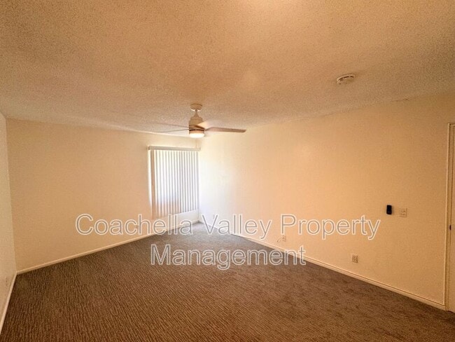 Building Photo - 1655 E Palm Canyon Dr