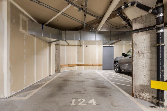 Building Photo - Chic, urban studio condo in the Pearl—Peaceful, In-unit w/d, 14-ft ceilings, deeded parking