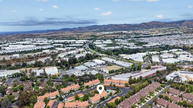 Building Photo - Gated Lake Forest Condo | Pool, Spa, Washer/Dryer & 3 Parking Spaces