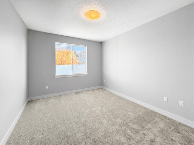 Building Photo - Brand-New 4-Bedroom Home in Nampa’s Pheasant Meadows | Near Gateway Center, Treasure Valley Marke...