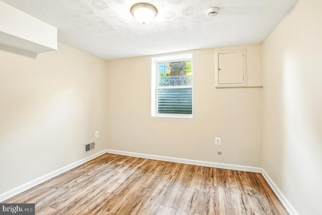 Building Photo - 9023 49th Pl