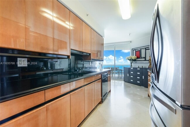 Building Photo - 18671 Collins Ave