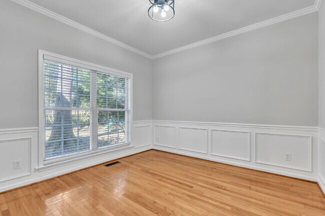 Building Photo - Beautifully Appointed 4BR Home Featuring a Screened Porch, Spacious Living Areas & Community Pool...