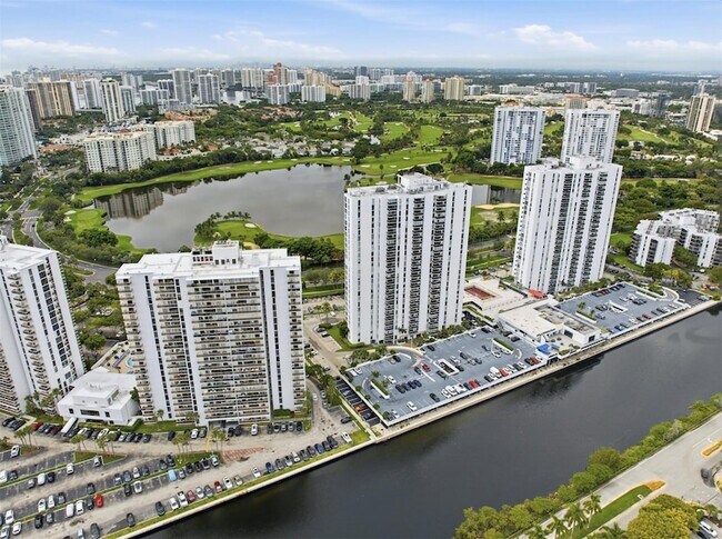 Building Photo - 3675 N Country Club Dr