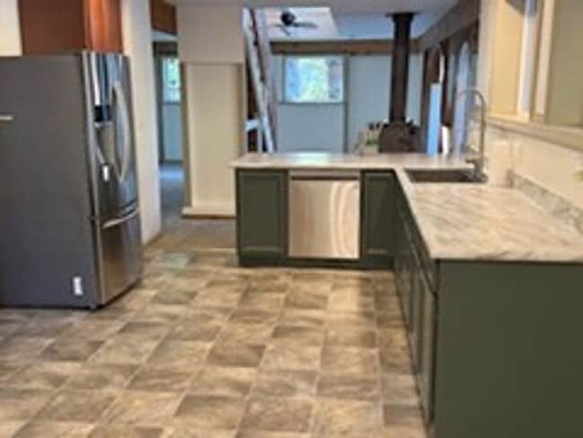 Building Photo - 3BED2BATH - NEWLY REMODELED WITH 3,000+ sq. ft. SHOP GARAGE, LARGE YARD, WASHER/DRYER HOOKUPS