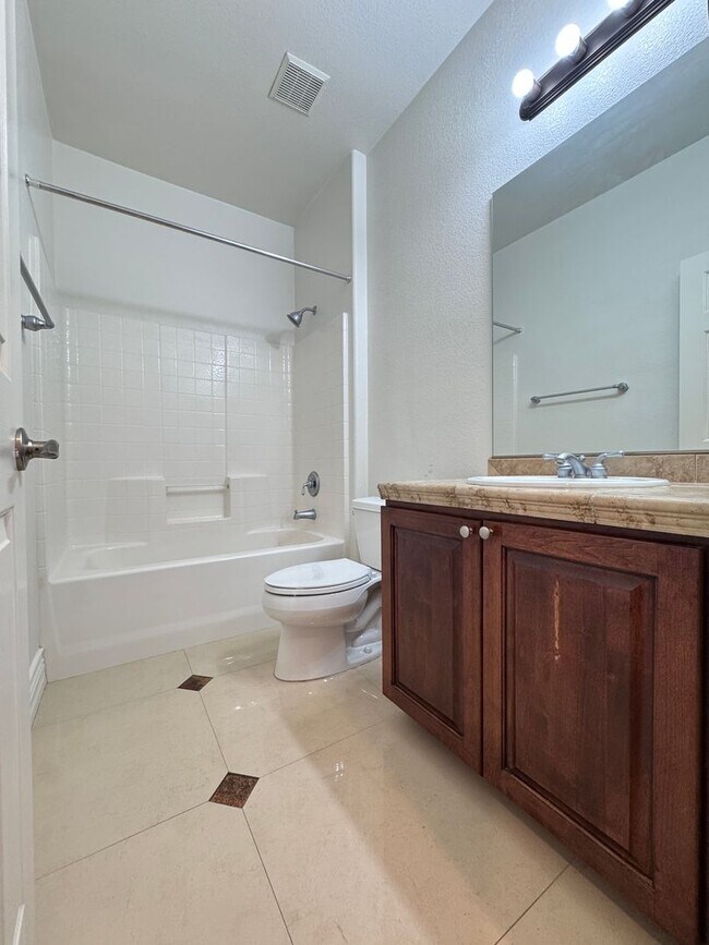 Building Photo - LUXURY LIVING • GOLF COURSE VIEW • GUARD-GATED COMMUNITY