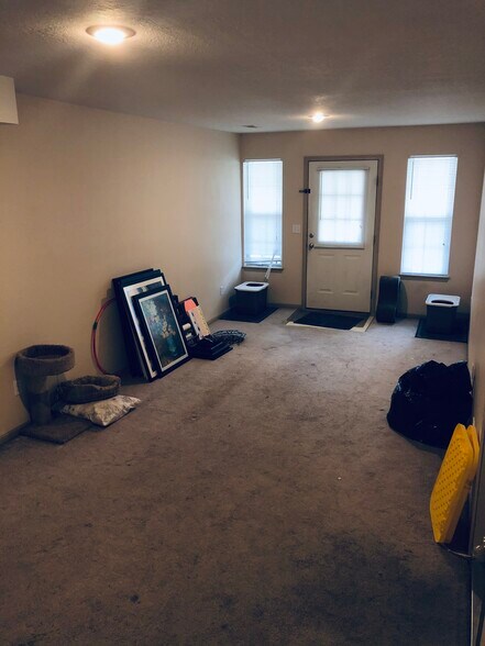 Downstairs living room - 1416 SE Henley Ct