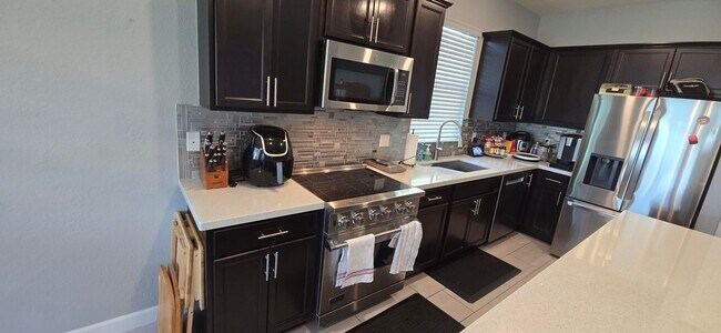 Building Photo - 12737 NW Milestone Pl