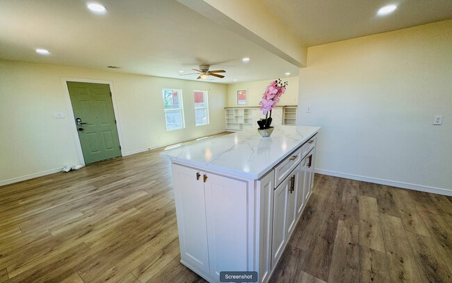 High-rise kitchen island with plenty of storage on 3 sides as well as USB ports - 807 N Lincoln St