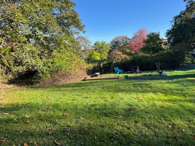 Vegetable beds and firepit - 30 E Elm St