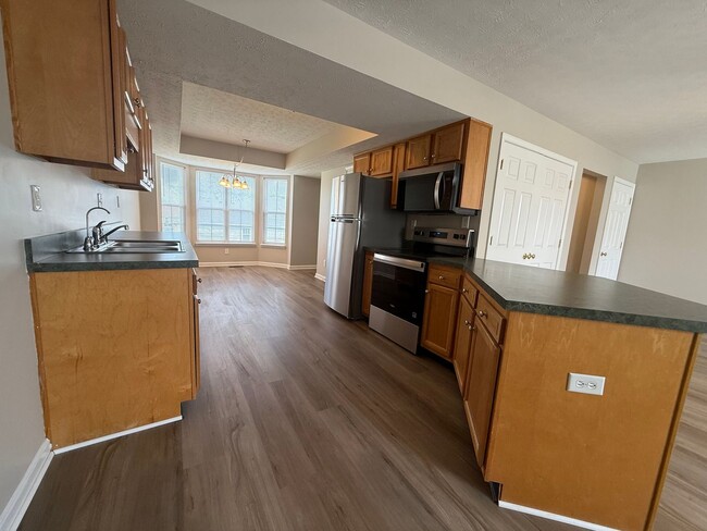 Building Photo - MOVE IN SPECIAL!! LARGE BEAUTIFUL 3 Bedroom 2.5 Bath Townhouse w/Finished Basement, Fenced in Yar...