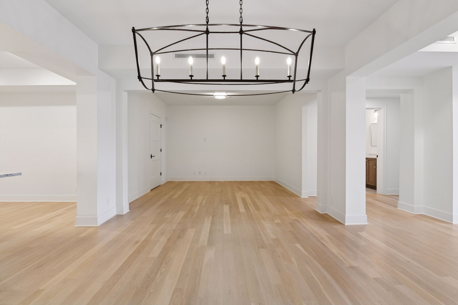 The dining area is designed with an open layout that seamlessly connects to the living spaces - 222 Ferndale Rd S