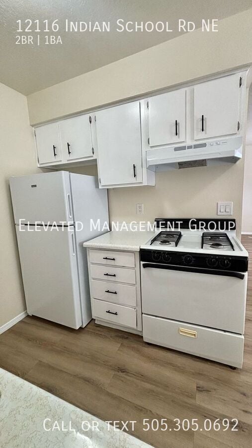 Building Photo - 12116 Indian School Rd NE