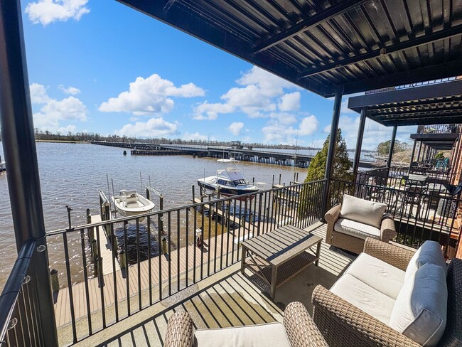 Building Photo - Fully Furnished Waterfront Elegance on Mai...