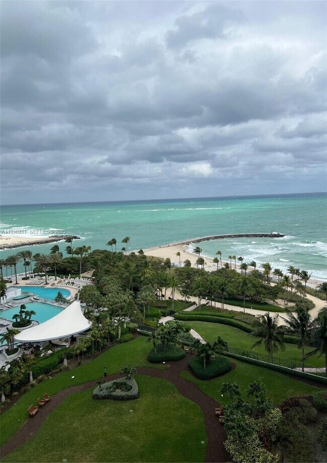 Building Photo - 10275 Collins Ave