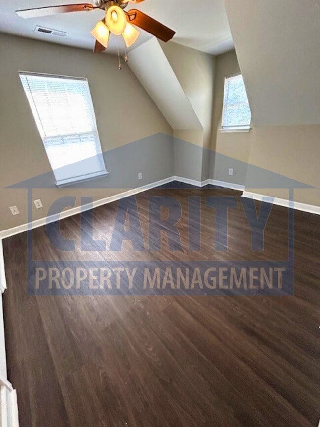 Building Photo - Charming three-bedroom home with carport!