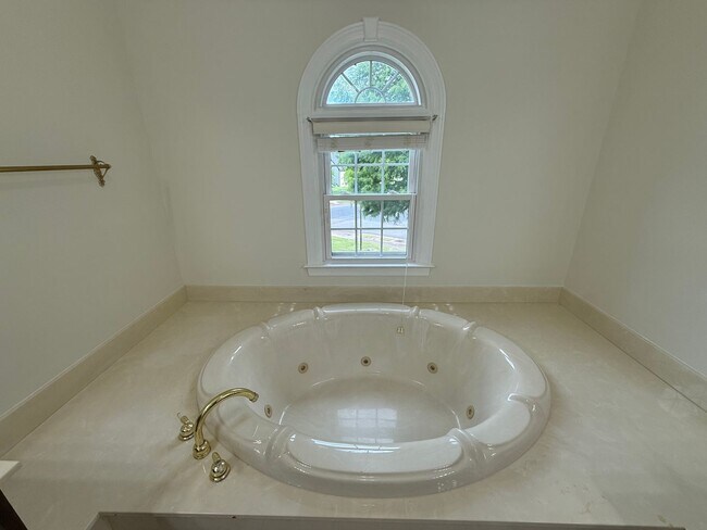Building Photo - Spacious 5-Bedroom Home on a Corner Lot in...