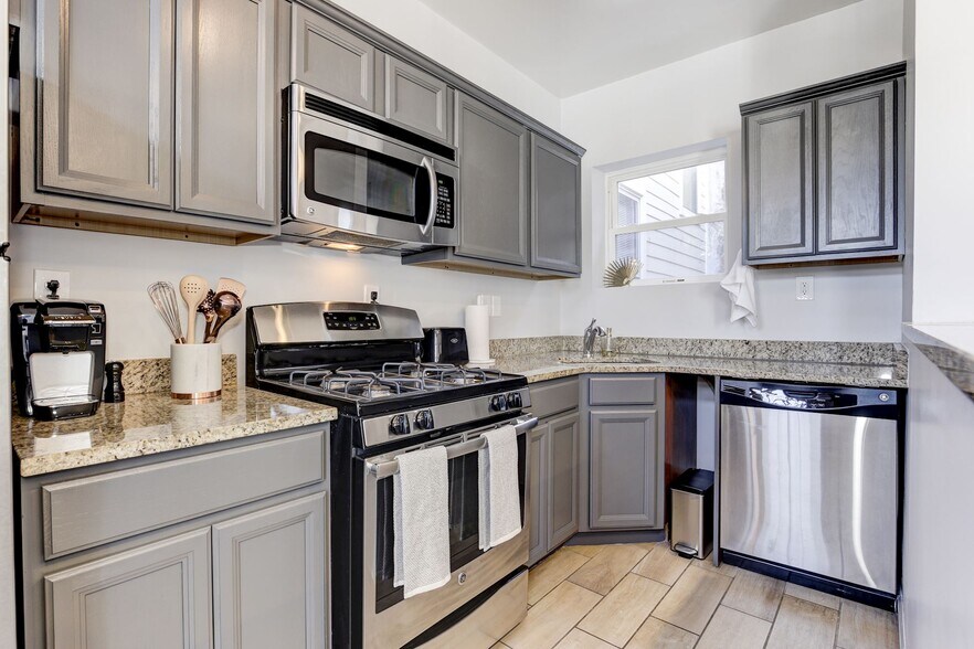 Renovated Kitchen with Granite Counters and Stainless Appliances - 1719 4th St NW