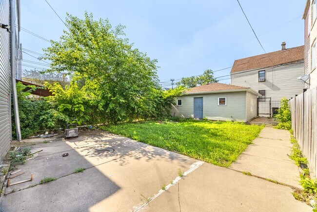 Building Photo - 4104 W 24th Pl