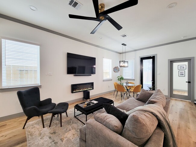 Building Photo - This 4-bedroom, 3-bathroom, two-story residence comes with a generous two-car attached garage. Re...