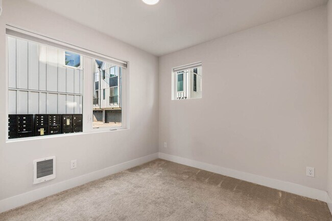 Building Photo - Contemporary Townhome with Attached 2-Car Garage