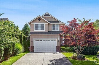 Building Photo - A Beautiful Picture Perfect Home with 4 Be...