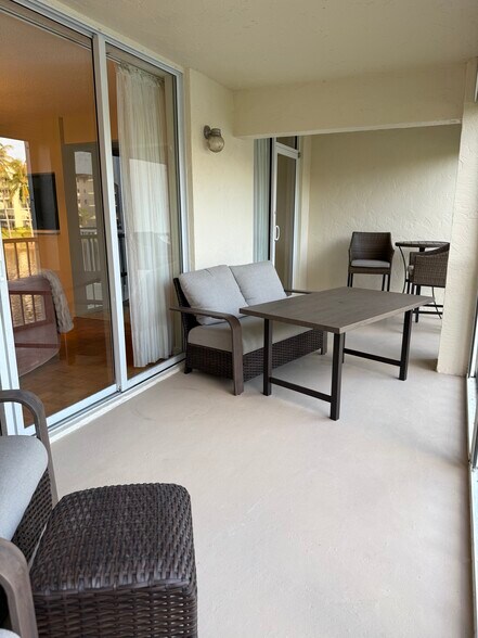 Outdoor patio for eating, working or entertaining. - 102 Half Moon Cir