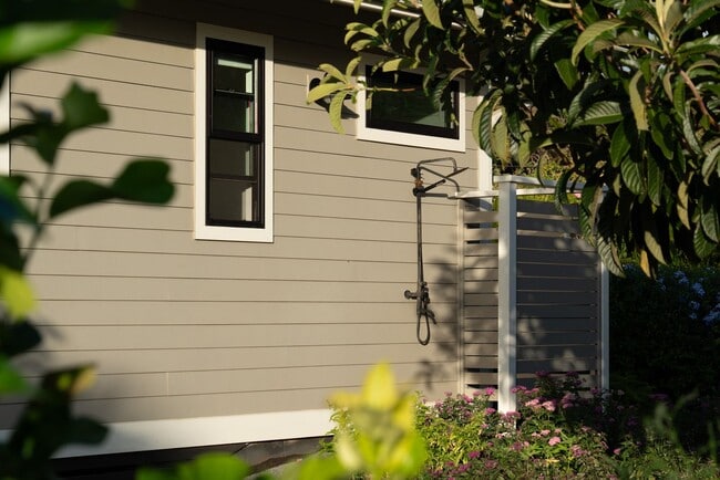 Building Photo - Elevated Haiku Retreat with Ocean Views, Designer Finishes & a Lush Edible Garden Sanctuary