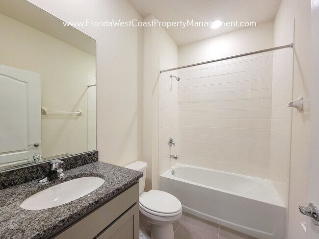 Building Photo - LAKEWOOD RANCH! 4 BEDROOM/2 BATH/ PET FRIENDLY! COMMUNITY POOl! READY for MARCH 2026