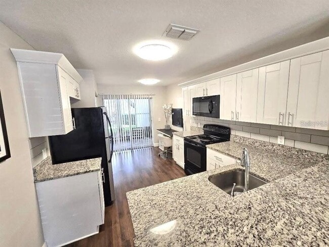 Building Photo - 7910 Hardwick Dr
