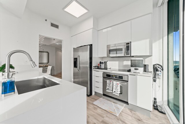 Building Photo - 6515 Collins Ave