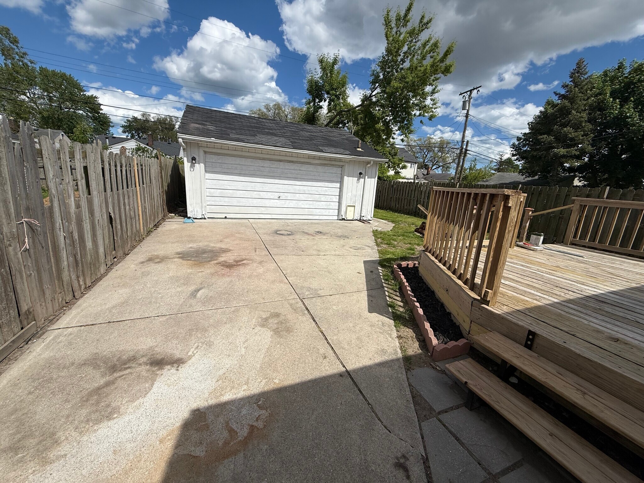 Large 2 car garage with new door opener - 25200 leach st