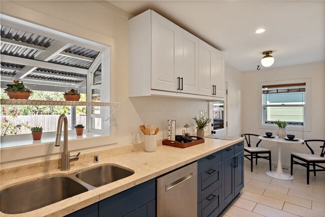 Building Photo - Bret Harte Gem Offering Comfort, Style & Convenience!  EV Charging!  Decks!  FOUNDATION