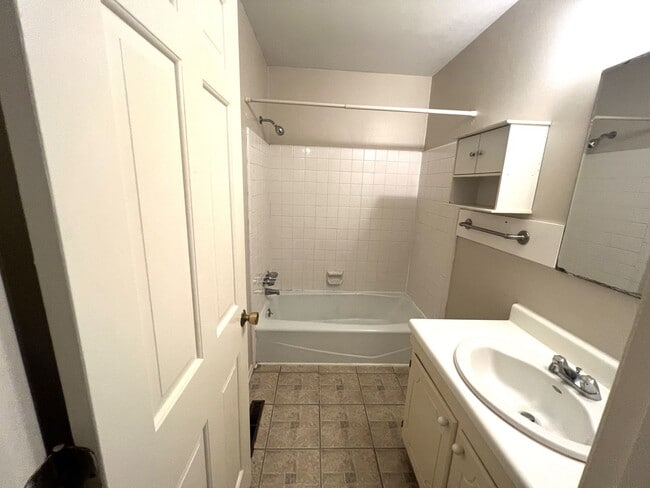 Building Photo - RENT SPECIAL! Just painted, modern gray! Charming end unit town home in Stones Throw. Walking dis...