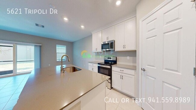 Building Photo - 5621 Tripoli Dr