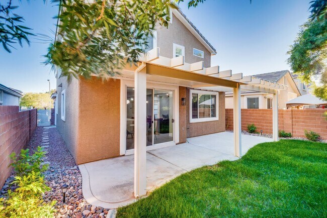 Building Photo - FULLY FURNISHED! Exudes sophistication with designer touches throughout