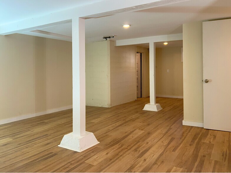 Lower level includes laundry, small bathroom, and two bedroom/office spaces, plus mixed-used area an - 3448 SW Canby St