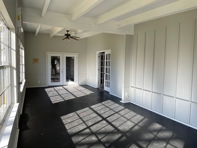 Sunroom access from the primary bedroom and living room - 1925 Driskill St