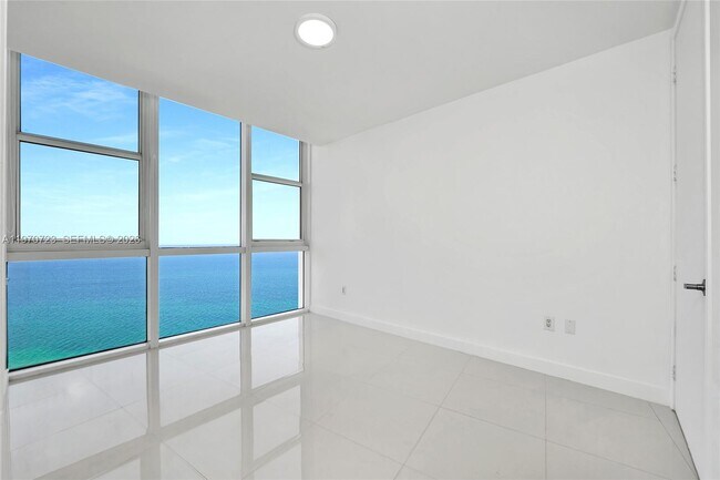 Building Photo - 18201 Collins Ave