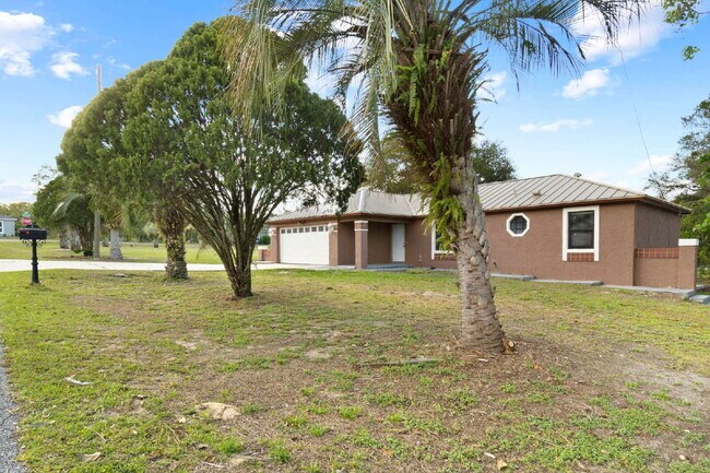 Building Photo - Comfort, Space & Convenience on a Peaceful Corner Lot in the Shores