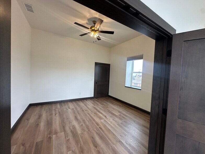 Bedroom one with walk in closet - 210 S Main St