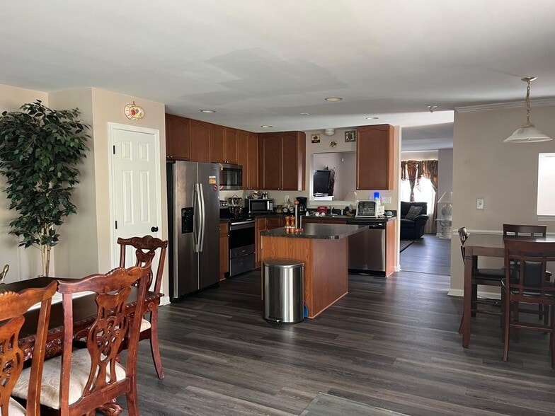 Kitchen from sitting area - 199 Rumbling Rock Rd