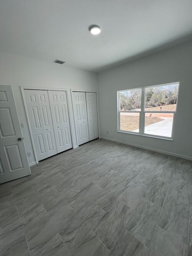 Building Photo - Brand-New Cozy 2BR/2BA Home- Prime Lake Placid Location