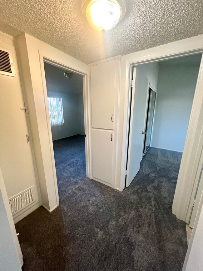 Building Photo - Spacious Two Bedroom with New Carpet - Available Now!
