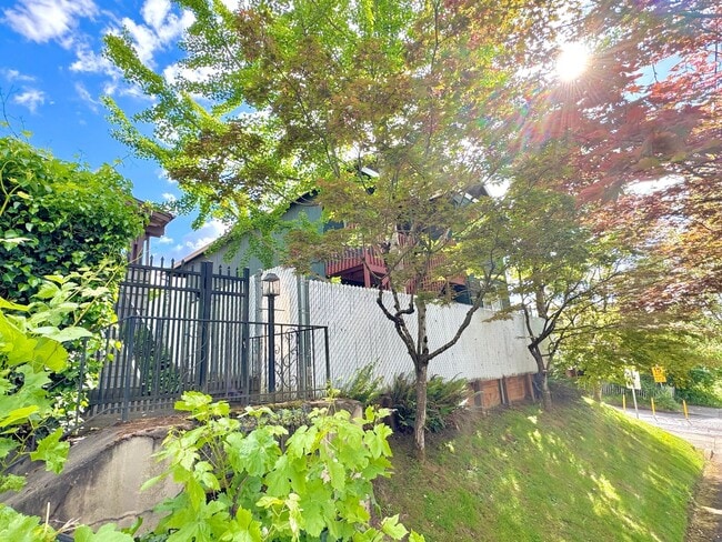 Building Photo - Montavilla Polished 2-Story with Hardwoods, Whole House A/C, Attached Garage, Off-street Parking