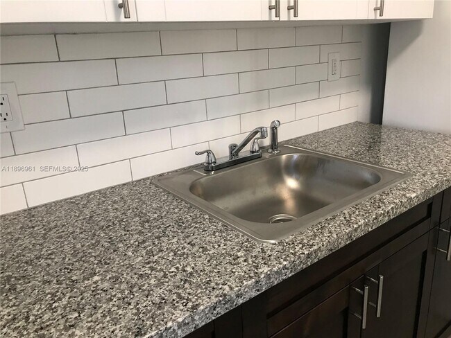 Building Photo - 5454 NW 5th Ave