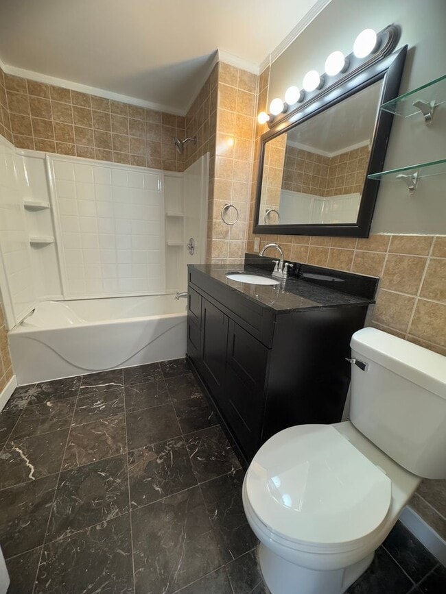 Building Photo - 4 bedroom home in the East Village of Dave...