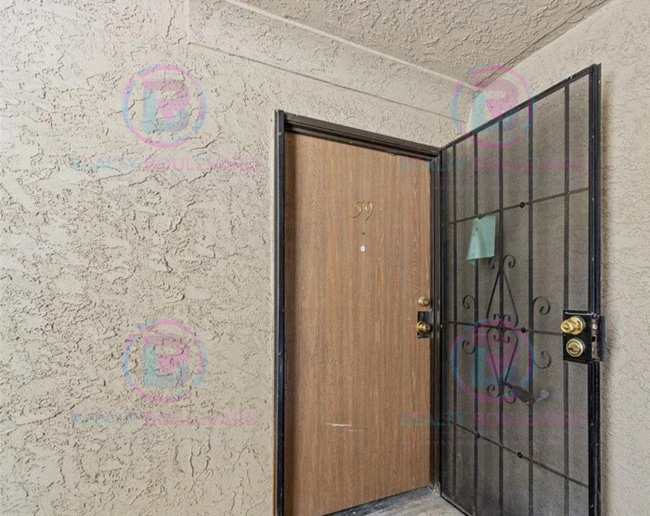 Building Photo - Incredible condo near UNR! This charming 2...
