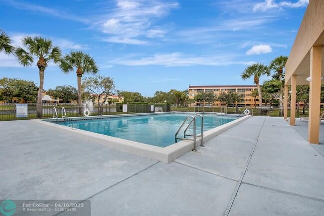 Building Photo - 8592 W Sunrise Blvd